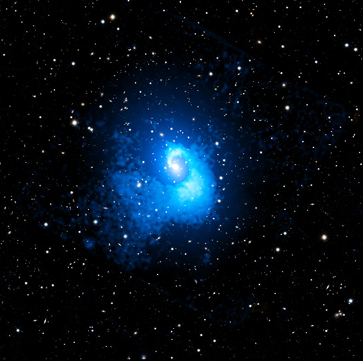 A composite image with X-ray inset of X-ray emitting little red dot.